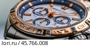 Luxury chronograph watch showing time and date. Стоковое AI-изображение, AI-художник Юрий Поздников / Фотобанк Лори