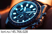 Luxury chronograph watch glowing in the dark on wrist. Стоковое AI-изображение, AI-художник Юрий Поздников / Фотобанк Лори