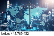 Scales of justice balancing on technological world map representing global law and order. Стоковое AI-изображение, AI-художник Юрий Поздников / Фотобанк Лори