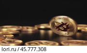 Gold Bit Coin BTC Cryptocurrency Coins on a black background. Bitcoin is a worldwide cryptocurrency and digital payment system called the first decentralized digital currency. Стоковое видео, видеограф Андрей Армягов / Фотобанк Лори