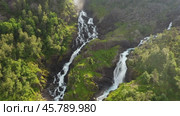 Latefossen is one of the most visited waterfalls in Norway and is located near Skare and Odda in the region Hordaland, Norway. Consists of two separate streams flowing down from the lake Lotevatnet. (2019 год). Стоковое видео, видеограф Андрей Армягов / Фотобанк Лори
