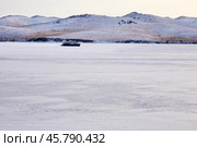 A hovercraft on the ice of the frozen Lake Baikal. Kivus is a transport on ice. Стоковое фото, фотограф Виктория Тельминова / Фотобанк Лори