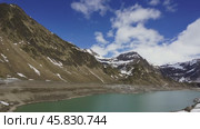 Mountain snow landscape with Lago di Ritom lake. Стоковое видео, видеограф Михаил Коханчиков / Фотобанк Лори