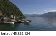 Como lake between mountains in Italy (2017 год). Стоковое видео, видеограф Михаил Коханчиков / Фотобанк Лори