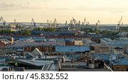 St. Petersburg, Russia, September 04, 2024: St. Petersburg roofs and shipyards top view. Редакционное фото, фотограф Igor Skripachev / Фотобанк Лори