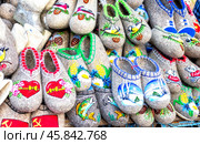 Traditional russian felted boots of different design and patterns. Embroidered felt boots for winter season. Стоковое фото, фотограф FotograFF / Фотобанк Лори