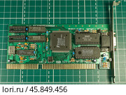 Karachev, Bryansk region Russia - January, 04, 2025: Vintage Trident graphics card on a TVGA9000B chip for assembling a retro PC with an i386SX processor. Virtual Museum of Electronics. Редакционное фото, фотограф Андрей Жигальцов / Фотобанк Лори
