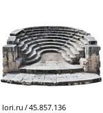 Ruins of ancient odeon showing stone seats and stage on white background. Стоковое AI-изображение, AI-художник Иван Рябоконь / Фотобанк Лори