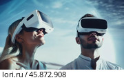 Happy smiling woman and man in futuristic style virtual reality headset. In low poly style, showing intelligent AI model with accurate wireframe design. Стоковое AI-видео, аниматор ALLA YURTAYEVA / Фотобанк Лори