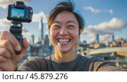 Young influencer creating content with camera on rooftop with city view. Стоковое AI-видео, аниматор Юрий Поздников / Фотобанк Лори