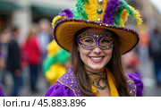 Vibrant Mardi Gras Celebration Featuring a Joyful Person in a Colorful Costume and Mask During a Lively Parade in New Orleans. Стоковое AI-изображение, AI-художник Sergey Grishin / Фотобанк Лори