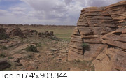 Rock formations and stacked stones in Mongolia. Стоковое видео, видеограф Михаил Коханчиков / Фотобанк Лори