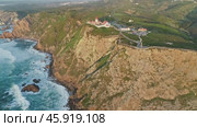 Aerial view of lighthouse at Cape Roca in Portugal (2019 год). Стоковое видео, видеограф Михаил Коханчиков / Фотобанк Лори