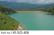 Lake Gizhgit in the Caucasus Mountains. Стоковое видео, видеограф Михаил Коханчиков / Фотобанк Лори