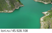 Lake Gizhgit in the Caucasus Mountains. Стоковое видео, видеограф Михаил Коханчиков / Фотобанк Лори