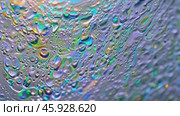 Colorful swirling oil and water mixture creating psychedelic patterns. Стоковое AI-видео, аниматор Юрий Поздников / Фотобанк Лори