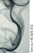Dark smoke rising on white background. Стоковое AI-видео, аниматор Юрий Поздников / Фотобанк Лори