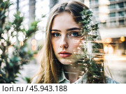 Portrait of a young woman. Conceptual artistic close-up image against the background of a city with double exposure and visual effects. An advertising move. Стоковое AI-изображение, AI-художник Photojuli / Фотобанк Лори