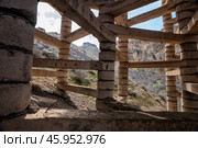 Вид сквозь селевую дамбу (2024 год). Стоковое фото, фотограф Юлия Бабкина / Фотобанк Лори