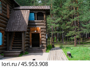 Restored 19th century wooden merchant's manor with lawn and wooden house in Ulan-Ude, Russia. The inscription 'Borisov's Shop' (2024 год). Стоковое фото, фотограф Сергей Фролов / Фотобанк Лори