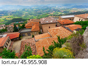 Landscape with roofs of houses in small tuscan town in province (2014 год). Стоковое фото, фотограф Олег Жуков / Фотобанк Лори