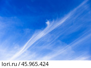Soft stripes of cirrus clouds are in blue sky, natural background texture. Стоковое фото, фотограф EugeneSergeev / Фотобанк Лори