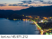 Beautiful view of the night embankment of the city of Sudak after sunset. South coast of the Crimean peninsula. Russia. Стоковое фото, фотограф Константин Лабунский / Фотобанк Лори