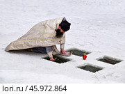 Освящение воды в полынье. Обряд в Крещение. 19 января. Редакционное фото, фотограф Александр Тараканов / Фотобанк Лори