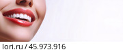 Beautiful Smile. Female smiling, perfect white teeth, close up. Healthy smiles. Perfect teeth of smiling young woman on a white background. Whitening. Dental clinic patient. Oral care, dentistry. Стоковое AI-изображение, AI-художник Марина Демидюк / Фотобанк Лори