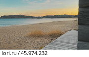 The view from the corner of a wooden house on the coast, with the cold sea beyond the Arctic Circle. Стоковое видео, видеограф Strunov David / Фотобанк Лори