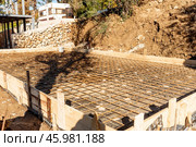 Construction site, residential building build, metal armature concrete structure. Стоковое фото, фотограф Spirit River / Фотобанк Лори