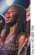 Enthusiastic singer performing with passion on stage. Стоковое AI-видео, аниматор Юрий Поздников / Фотобанк Лори