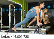 Woman in a Pilates class. Стоковое фото, фотограф Яков Филимонов / Фотобанк Лори