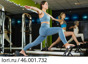 Woman in a Pilates class. Стоковое фото, фотограф Яков Филимонов / Фотобанк Лори