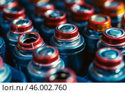 Lithium battery cells forming repeating pattern in industrial production line. Стоковое AI-изображение, AI-художник Иван Рябоконь / Фотобанк Лори