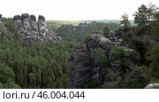Горы Саксонской  Швейцарии. Вид с моста Бастай. Германия. Лето. Mountains of Saxon Switzerland. View from the Bastei Bridge. Germany. Summer. Редакционное видео, видеограф Горшков Александр / Фотобанк Лори