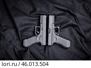 handgun on black background. Стоковое фото, фотограф Сергей Толмачёв / Фотобанк Лори