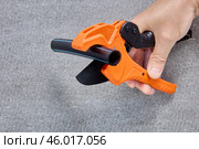 Ratcheting plastic pipe cutter for easy one handed operation. Стоковое фото, фотограф Владимир Григорьев / Фотобанк Лори