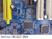 Микросхемы на печатной плате прибора. Circuit board macro as background. Стоковое фото, фотограф Татьяна Д / Фотобанк Лори