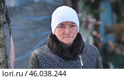 Portrait of a homeless woman struggling with alcohol addiction, highlighting the hardships of poverty, despair, and social marginalization. Стоковое фото, фотограф Mikhail Davidovich / Фотобанк Лори