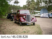 FINOWFURT, GERMANY - MAY 11, 2024: The full-size car Ford V8 (Model 48), 1935. Art lens. Swirl bokeh. Season opening of the Race 61 Festival. Редакционное фото, фотограф Sergey Kohl / Фотобанк Лори