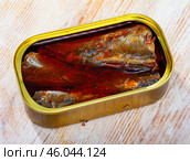 Open tin can of spicy sardines in aluminium can. Стоковое фото, фотограф Яков Филимонов / Фотобанк Лори