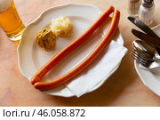 Popular Austrian sausages dish served with mustard and fresh horseradish. Стоковое фото, фотограф Яков Филимонов / Фотобанк Лори