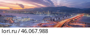 Evening panorama of Krasnoyarsk. Nikolaevsky 4th bridge and railway bridge over the Yenisei River at dawn. A Beautiful Scenic Panoramic View of a Vibrant City at Sunset Over a Peaceful River. Стоковое фото, фотограф Владимир Разгуляев / Фотобанк Лори