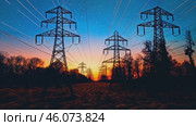 Overhead line pylons, high voltage pylons. Power transmission towers and lines at sunset. A shot of high voltage electric transmission tower, also known as electricity pylon. Стоковое видео, видеограф ALLA YURTAYEVA / Фотобанк Лори