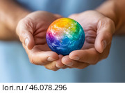 Планета Земля в ладонях человека. Стоковое AI-изображение, AI-художник Щеголева Ольга / Фотобанк Лори