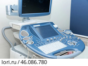 Ultrasound machine with sensor close-up. The sensor of the ultrasound machine in the doctor's office. Surgery clinical computer room. Advance ultrasound machine in hospital. High quality photo. Стоковое фото, фотограф Ирина Михайличенко / Фотобанк Лори