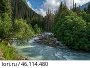 View of the Klukhor River near the Kosygin glade (Buulu Tala) in the Gonachkhir Gorge Dombai on a sunny summer day, Dombai, Karachay-Cherkessia, Russia. Стоковое фото, фотограф Ula Ulachka / Фотобанк Лори