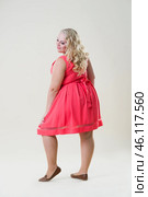 Plus size fashion model, fat woman on beige background, overweight female body. Стоковое фото, фотограф Станислав Тарко / Фотобанк Лори
