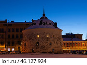Старинная круглая башня поздним зимним вечером. Выборг. Редакционное фото, фотограф Дмитрий Мельников / Фотобанк Лори